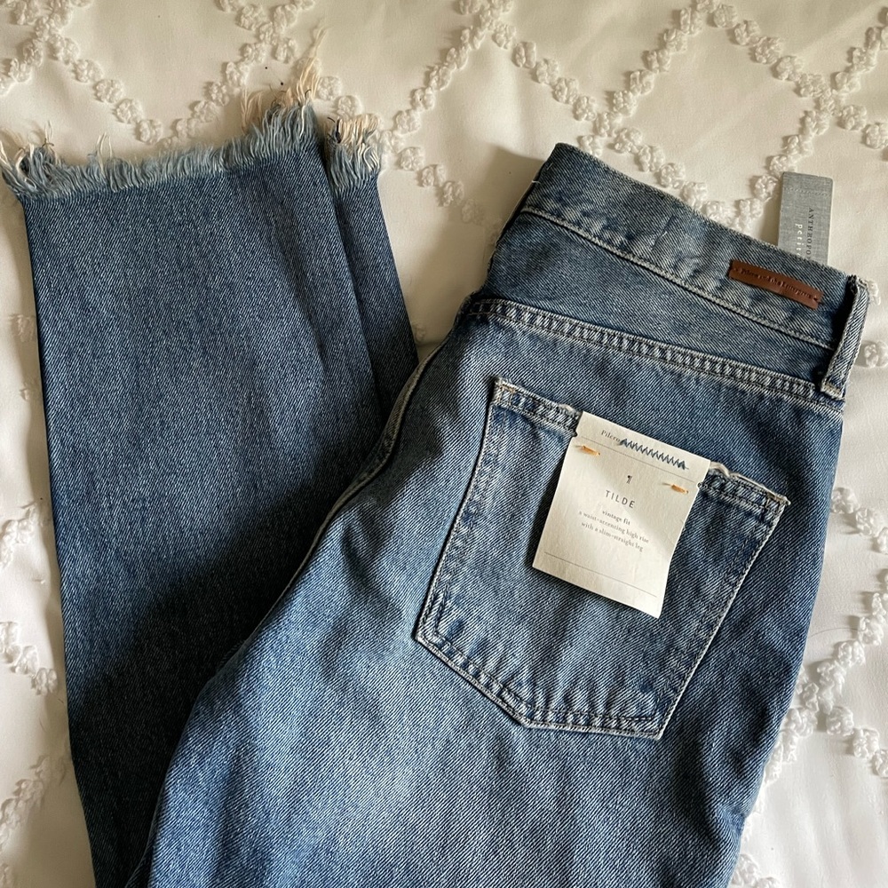 Pollo and the letterpress jeans from Anthropology.
